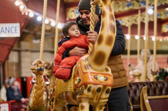 Opening night at the Let it Glow - A Celebration of Light festival features free rides at the Lakeside Park Carousel.